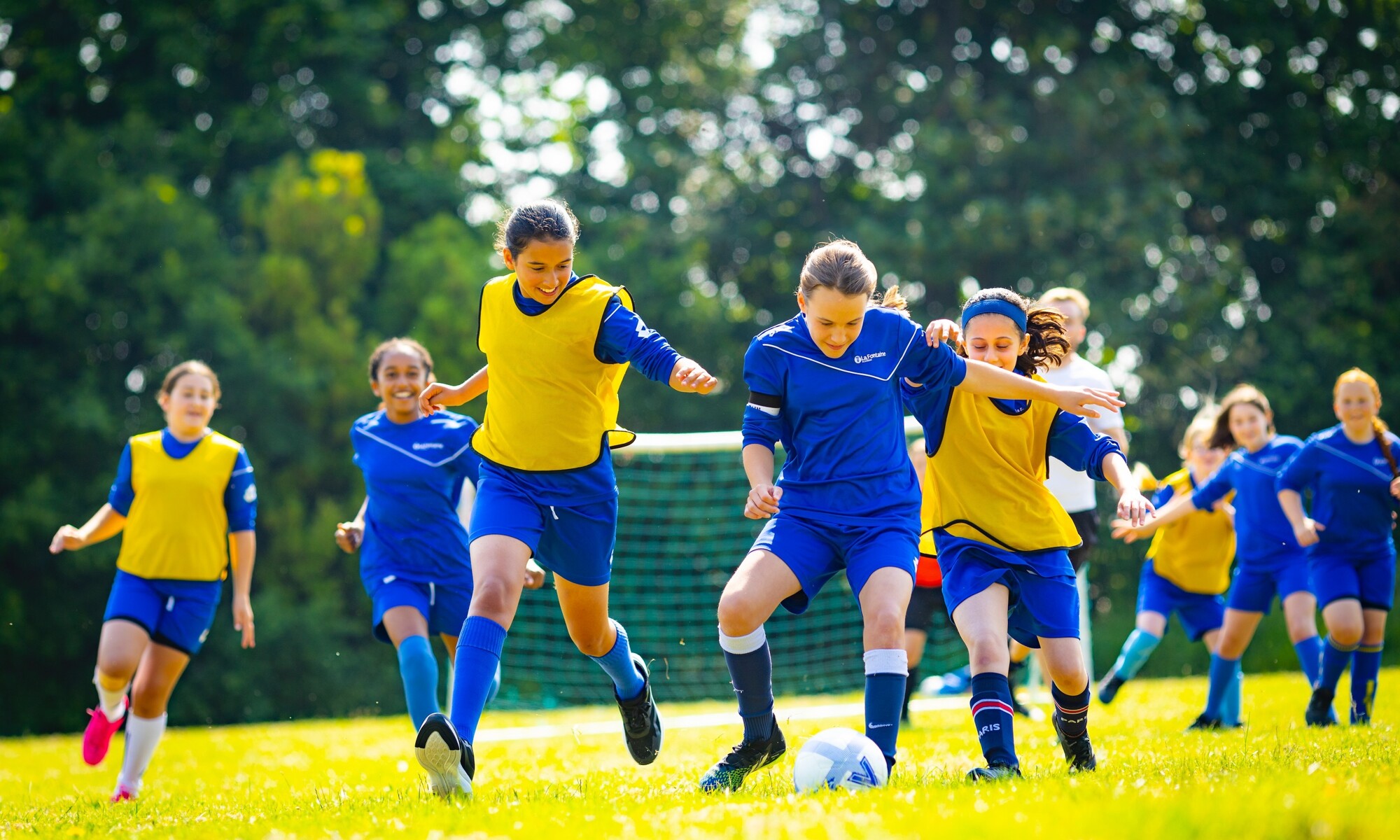 La Fontaine Academy of Pupils Playing Football